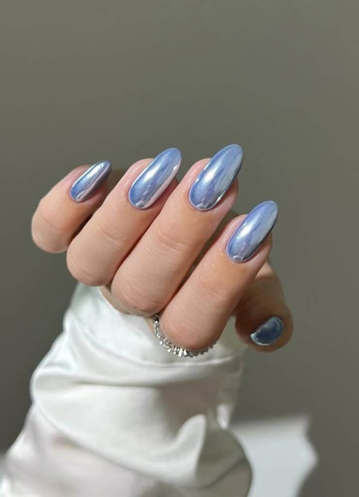 Blue chrome summer nails with metallic shine